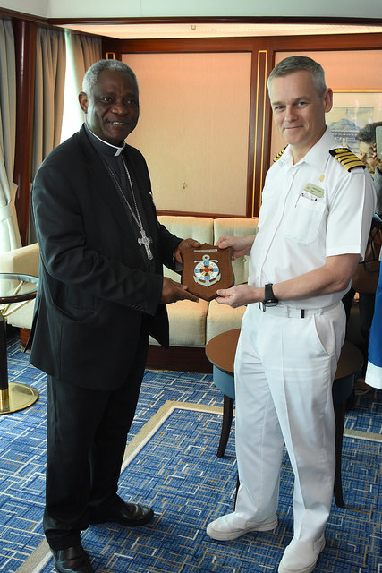Cardinal Turkson presents Captain Stephen Howarth with the AoS crest
