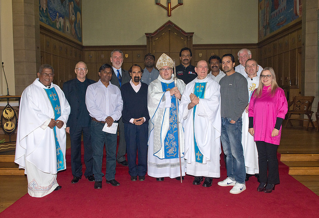 Bishop Stephen Robson with the crew of Malaviya Seven at the Stella Maris Mass in Aberdeen
