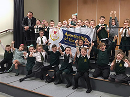 Pupils touching prayer for seafarers