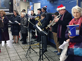 AoS brings Christmas cheer to commuters